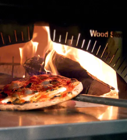 Naples pizza out of a Wood Stone Oven