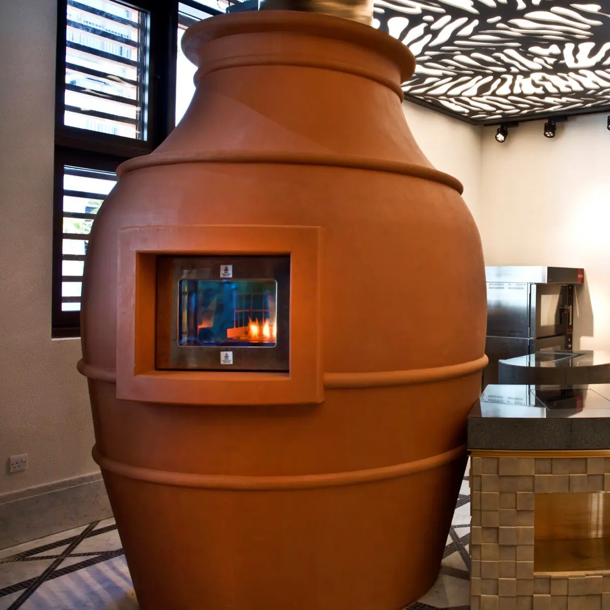 Custom facade on a Mt. Chuckanut oven with viewing window